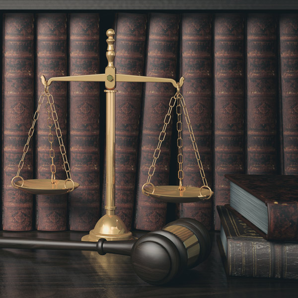 bookcase with scale and gavel